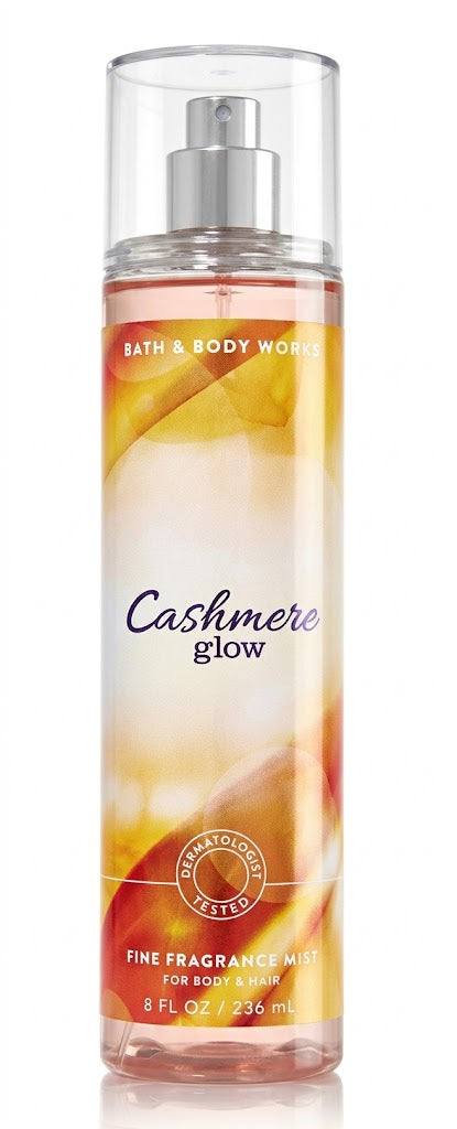 Bath & Body Works CASHMERE GLOW Fine Fragrance Mist 8 oz bottle on a pure white background with warm golden peach, vanilla and cashmere musk fragrance notes.
