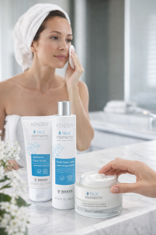 Woman applying True Elements skincare as part of the Glow Starter Ritual 3-step organic radiance and hydration routine.