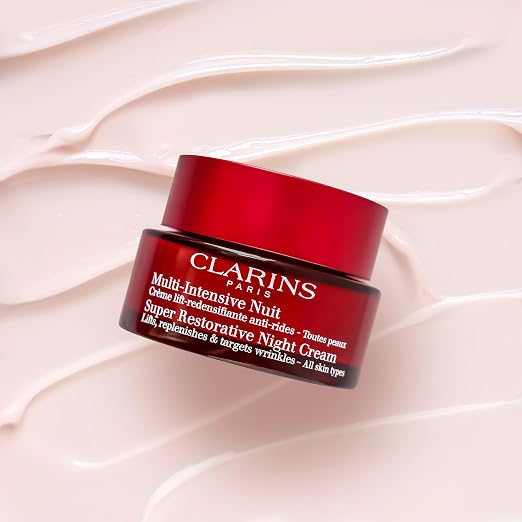 CLARINS Super Restorative Night Cream texture or application detail for luxury anti-aging skincare and hydration