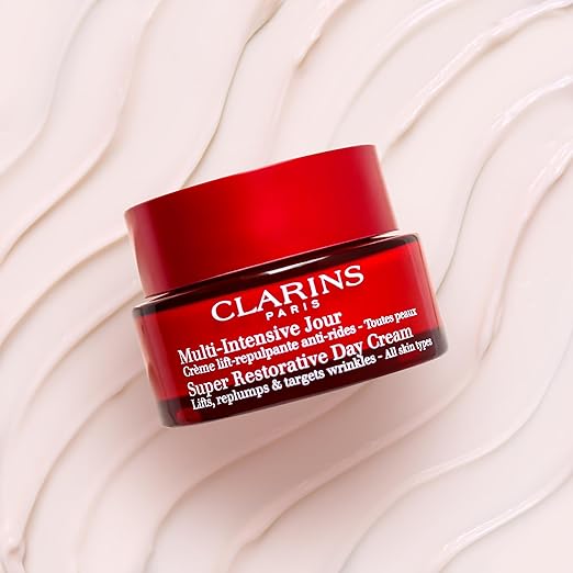 CLARINS Super Restorative Day Cream texture or application detail for luxury anti-aging skincare and hydration