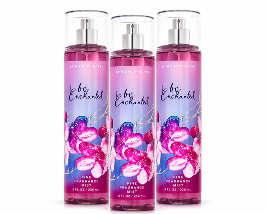 Bath & Body Works BE ENCHANTED Fine Fragrance Mist 3-Pack 8 oz bottles arranged in MWG style with one bottle in front and two slightly behind featuring sparkling berries, delicate florals and soft vanilla musk on a pure white background for gifting and everyday wear