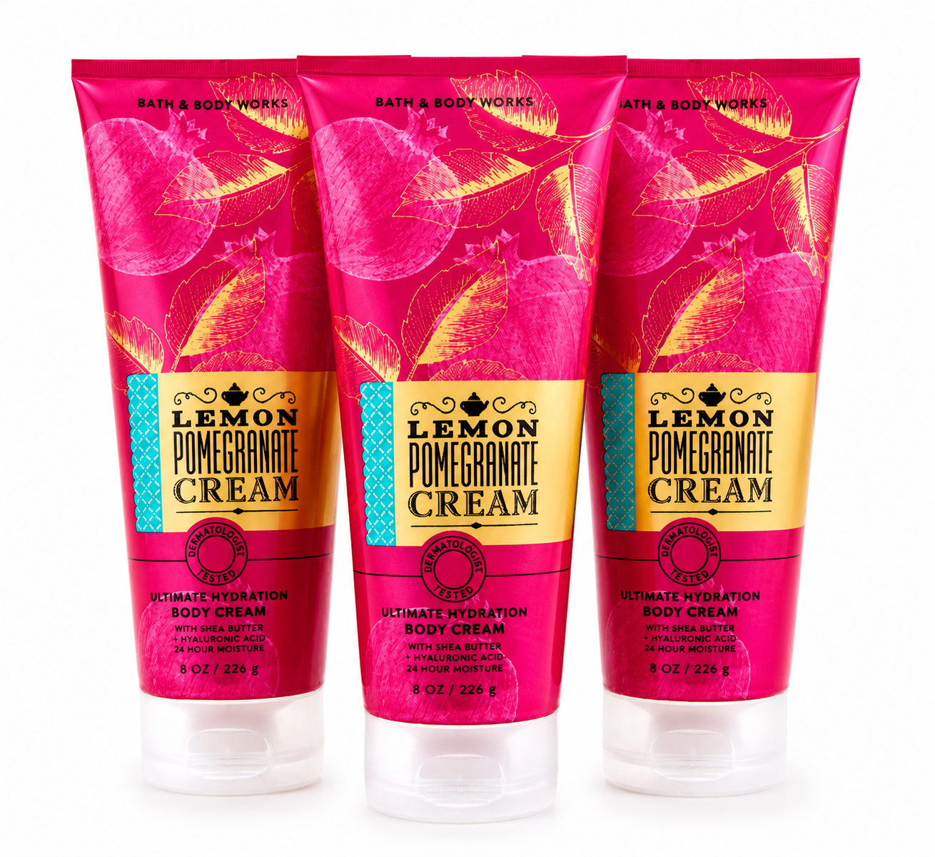Bath & Body Works LEMON POMEGRANATE CREAM Ultimate Hydration Body Cream 3-Pack 8 oz tubes arranged in MWG style with one tube in front and two slightly behind featuring bright lemon, juicy pomegranate and sweet cream fragrance with Shea Butter and Hyaluronic Acid on a pure white background for gifting and everyday hydration