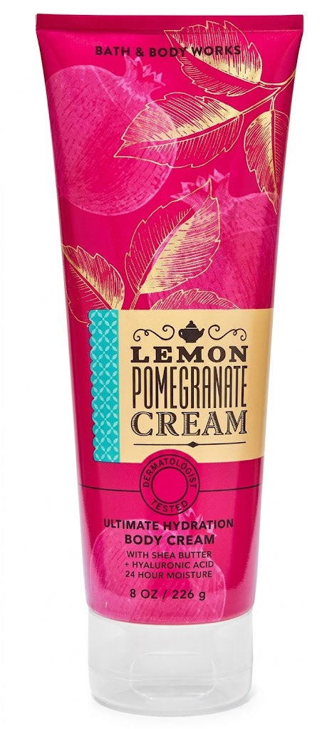 Bath & Body Works LEMON POMEGRANATE CREAM Ultimate Hydration Body Cream 8 oz single tube featuring bright lemon, juicy pomegranate and sweet cream fragrance with Shea Butter and Hyaluronic Acid on a pure white background