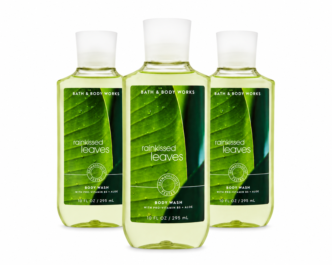 Bath & Body Works RAINKISSED LEAVES Body Wash 3-Pack 10 oz bottles arranged in MWG style with one bottle in front and two slightly behind on a pure white background featuring a fresh green botanical fragrance inspired by rain-kissed leaves