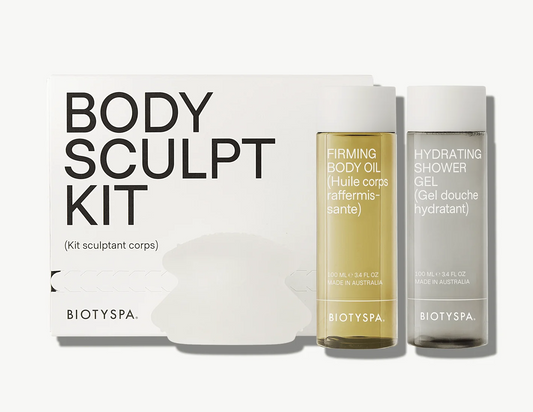 Biotyspa Body Sculpt Kit luxury body care self care set featuring firming body oil hydrating shower gel and body sculpt massage tool