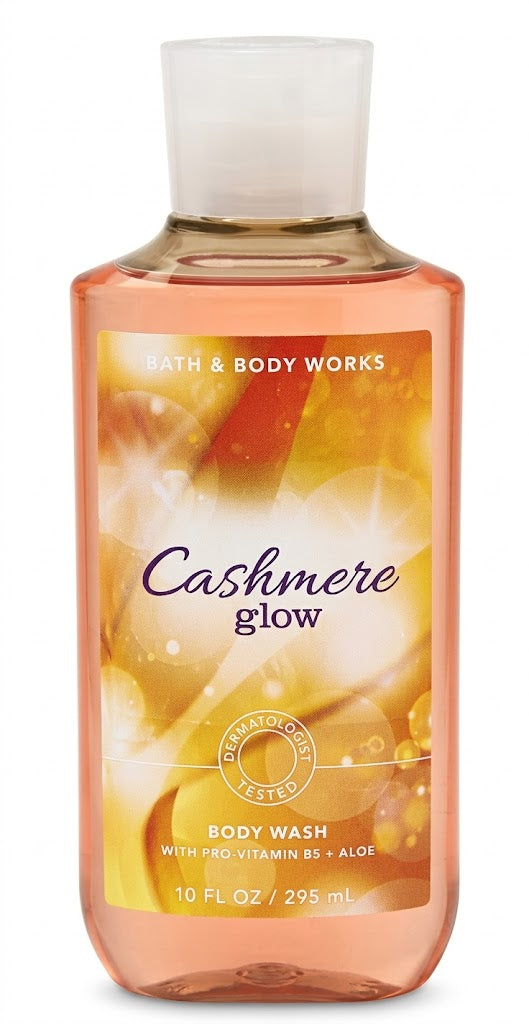 Bath & Body Works CASHMERE GLOW Body Wash 10 oz single bottle on pure white background featuring a warm blend of golden peach, cashmere musk and vanilla-inspired fragrance notes.