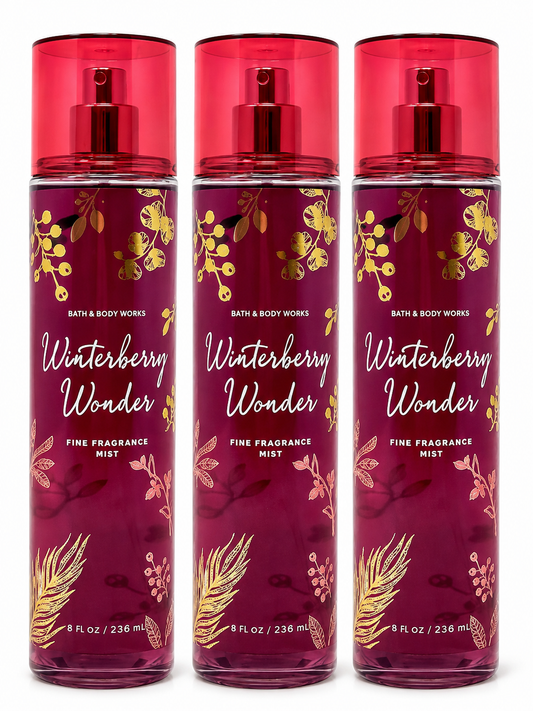 Three Bath & Body Works Winterberry Wonder Fine Fragrance Mist spray bottles lined up side by side on a white background.