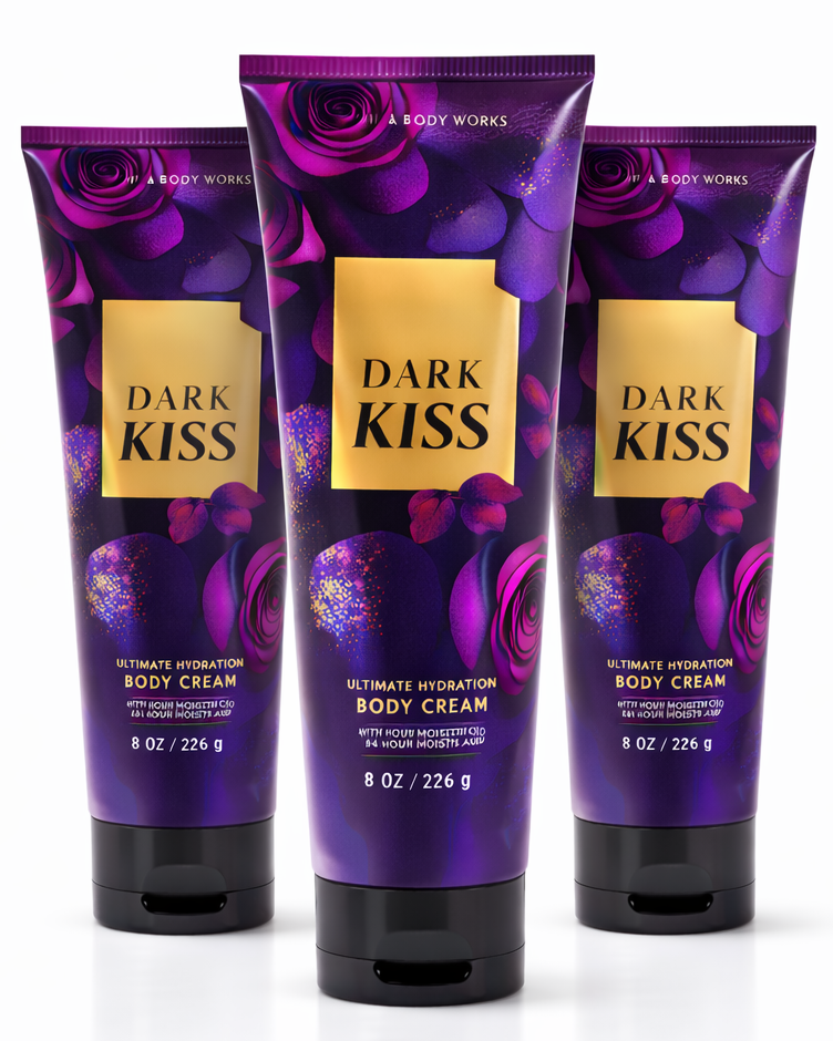 Three tubes of 'Dark Kiss' body cream from Bath & Body Works on a white background