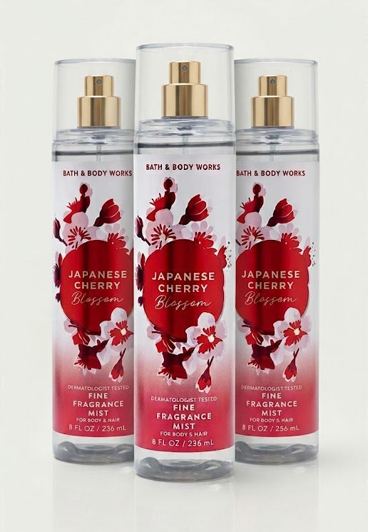 Bath & Body Works JAPANESE CHERRY BLOSSOM Fine Fragrance Mist 3-Pack 8 oz bottles arranged in MWG style with one bottle in front and two slightly behind featuring Japanese cherry blossom petals, Asian pear and fresh mimosa petals on a pure white background for gifting and everyday wear