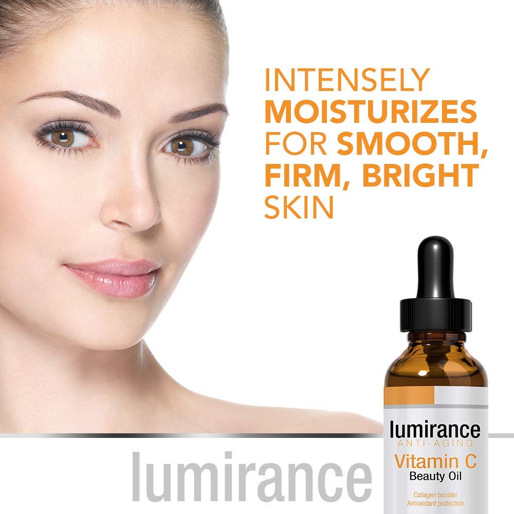 Woman applying PHARM TO TABLE LUMIRANCE Vitamin C Beauty Oil to her face