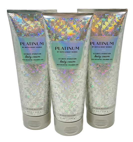 Three tubes of Bath & Body Works Platinum body cream on a white background