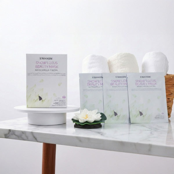 Snow Lotus bio-cellulose face mask spa display hydrating skincare treatment for radiant skin