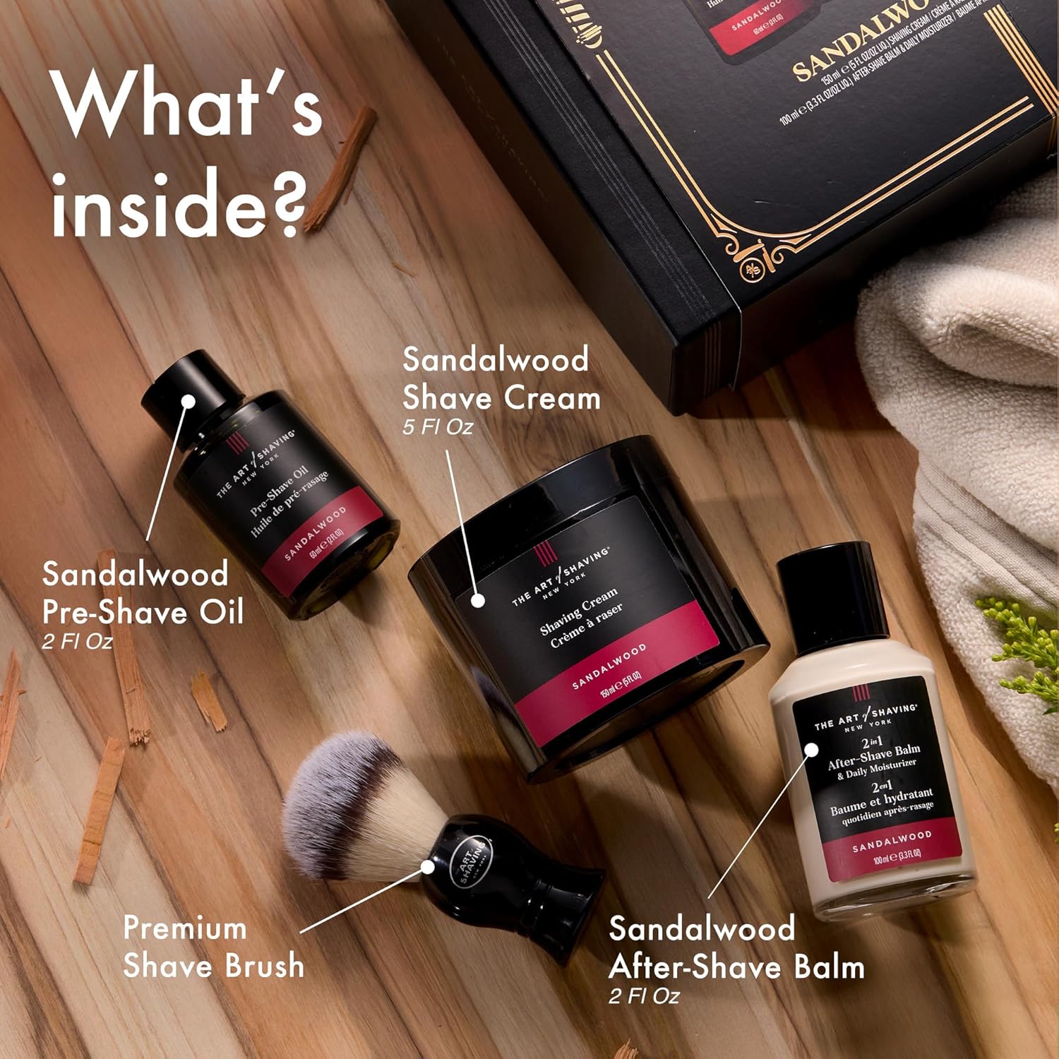 Luxury men’s grooming kit showing THE ART OF SHAVING Sandalwood collection with shaving cream, pre-shave oil, after-shave balm, and premium shaving brush.
